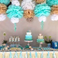 red paper flowers in the design of the photo hall