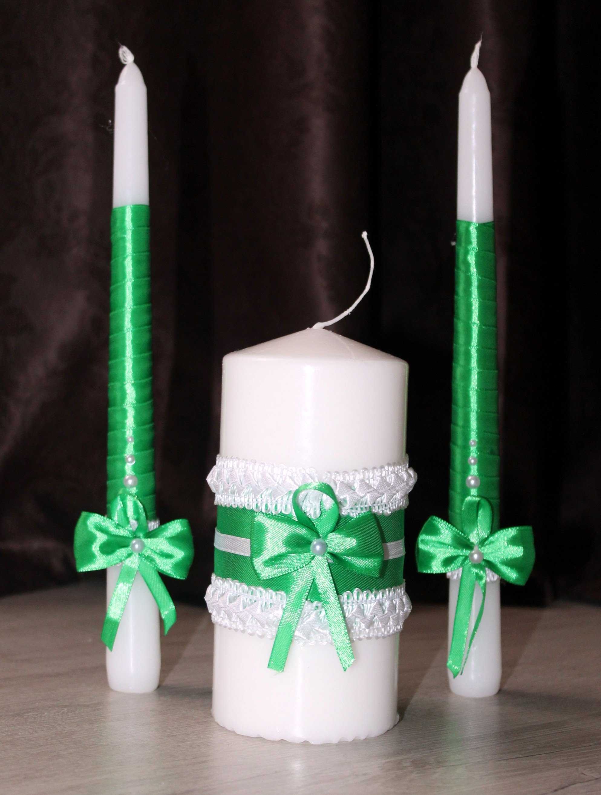 the idea of brightly decorating candles with your own hands