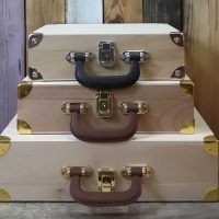 beautiful bedroom interior with old suitcases photo