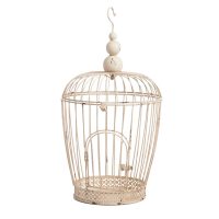 the idea of an unusual interior room with a decorative cage photo