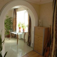 the idea of an unusual design of a bedroom with an arch photo