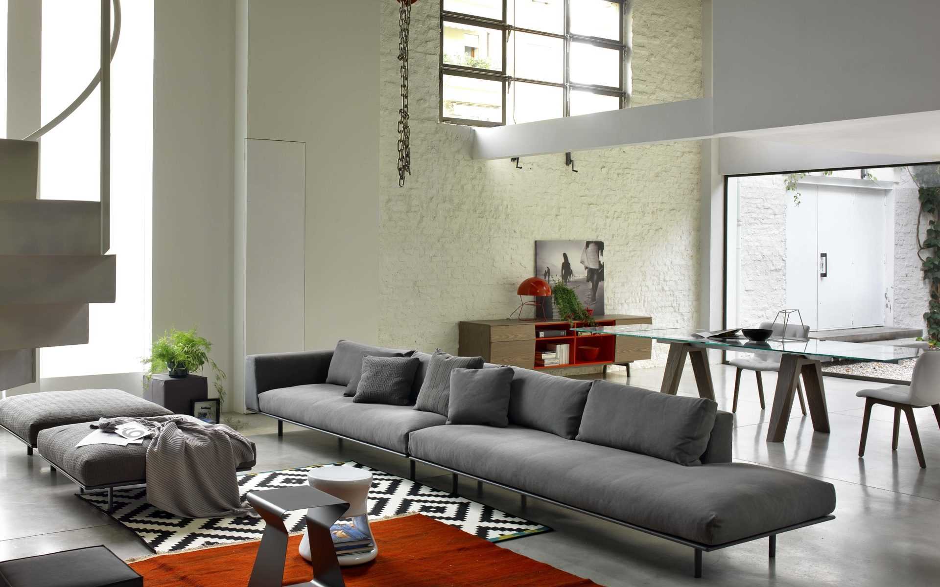 the idea of an unusual design of an apartment with a sofa