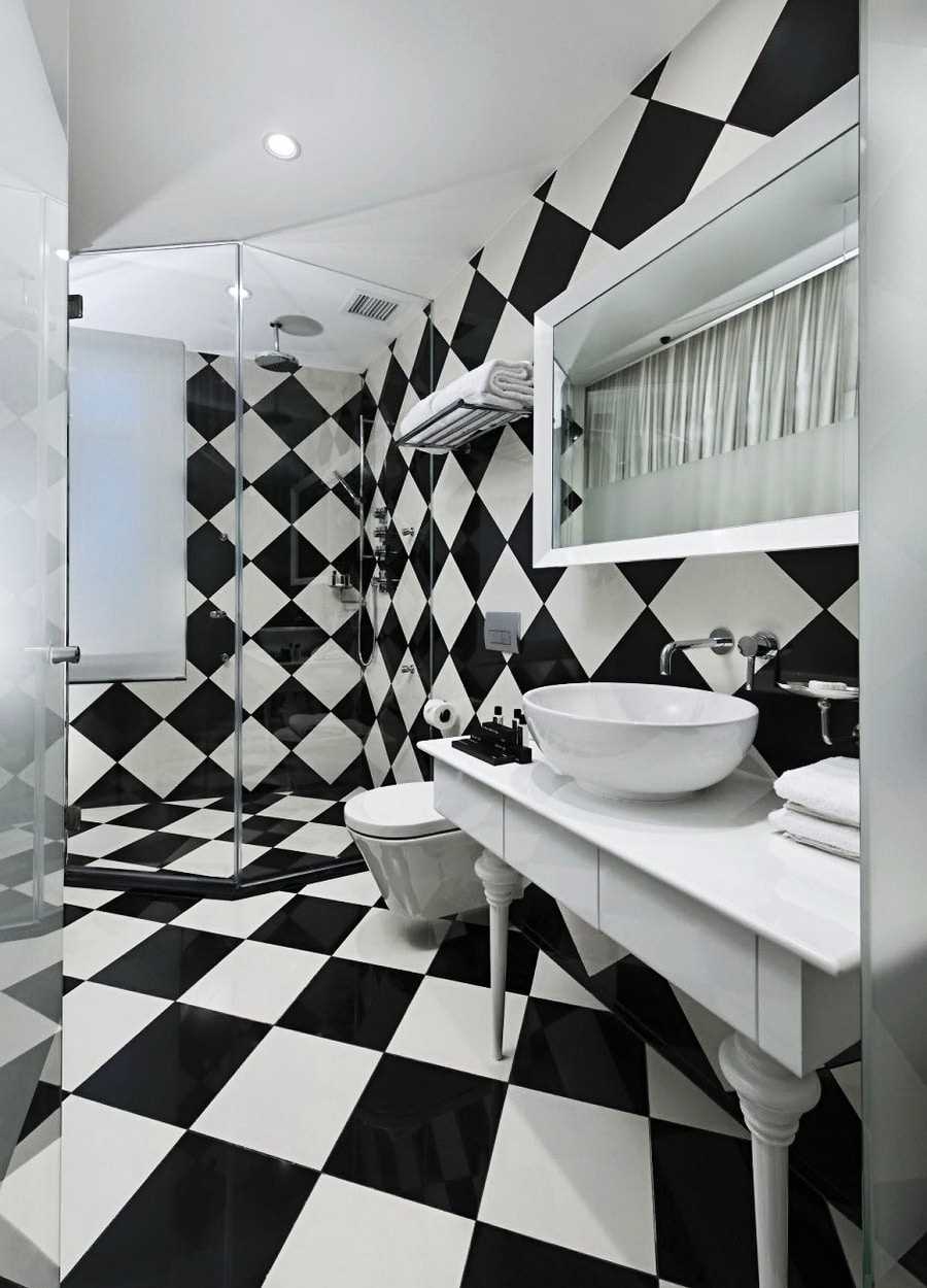 the idea of a beautiful bathroom interior in black and white