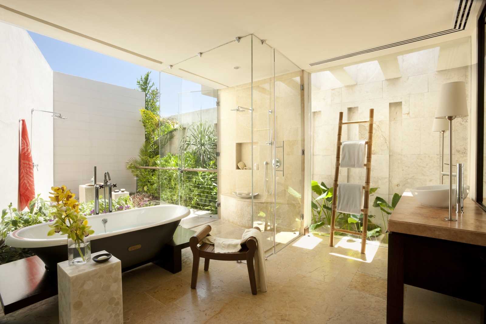 idea of bright design of a bathroom with a window