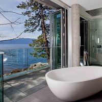 idea of a bright interior of a bathroom with a picture window