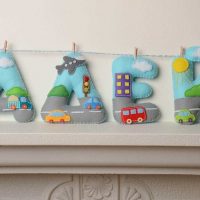 the idea of using decorative letters in the design of the living room photo