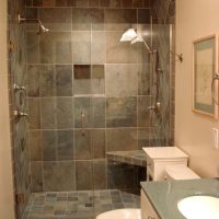 version of the unusual design of the bathroom in beige color photo