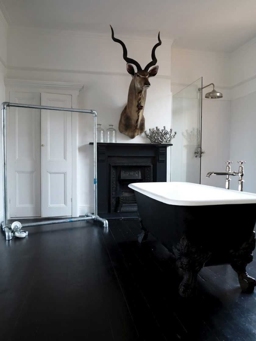 the idea of an unusual bathroom interior in black and white