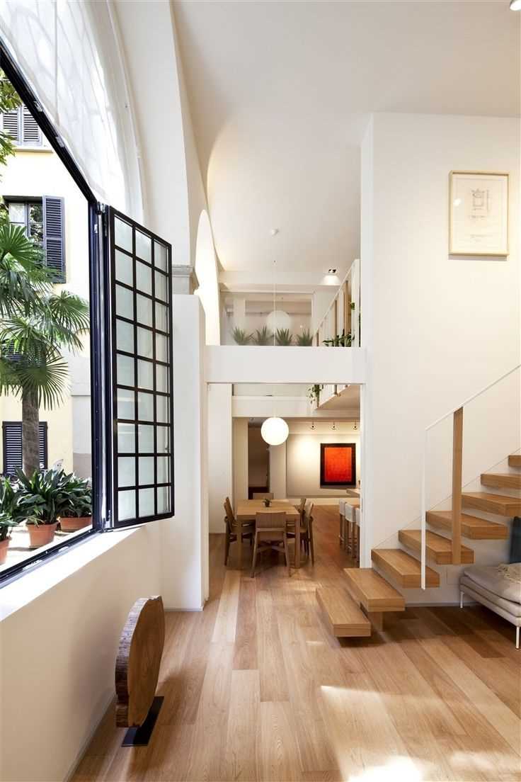 the idea of using a light laminate in an unusual apartment decor