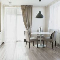 the idea of using a light laminate in a bright apartment style photo