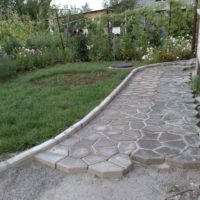 the idea of using unusual garden paths in landscape design photo