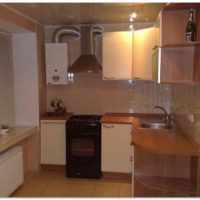 idea of a bright style kitchen with a gas water heater photo