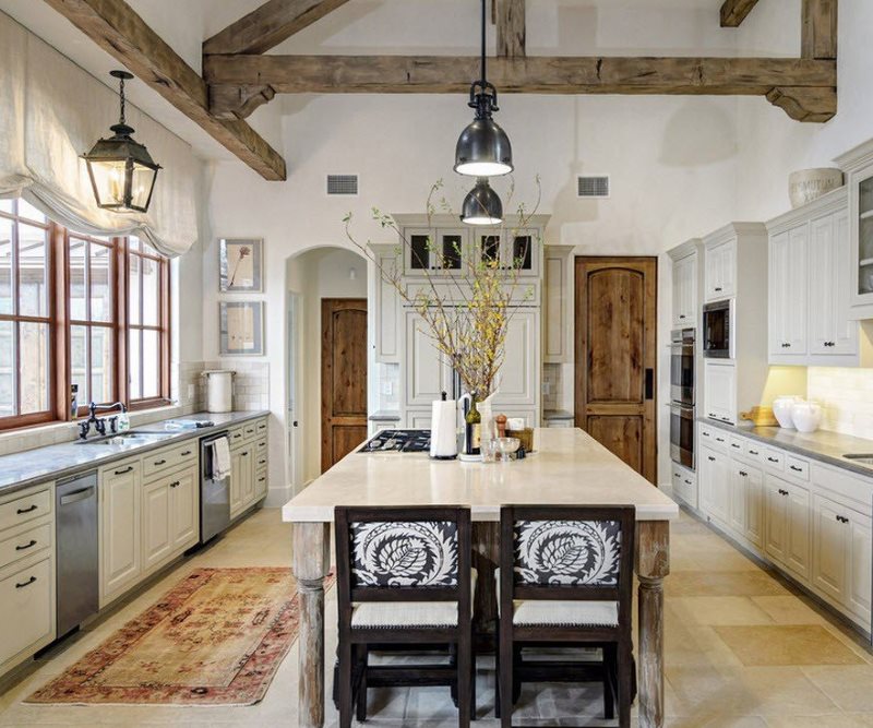 Wooden doors as contrasting interior details in Provence style