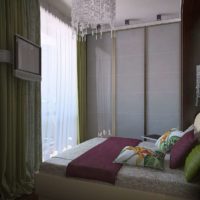 TV en face du lit dans la chambre à coucher à Khrouchtchev