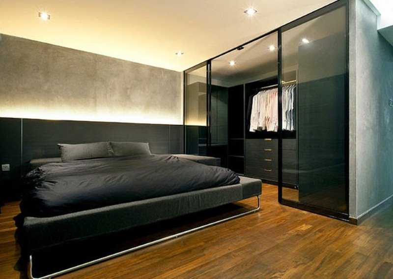 Design of a strict men's bedroom in black colors