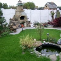 Pierre barbecue four dans la cour