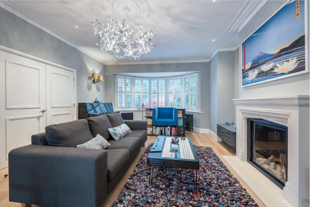 Coffee table in the form of a tape cassette in the interior of the room