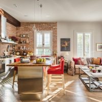 Cuisine de style loft avec meubles rembourrés