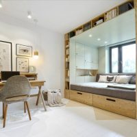 Sofa bed in front of a children's room window