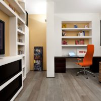 Red armchair at the desk