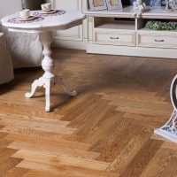 Round table with curly leg