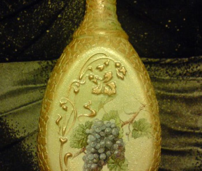 Eggshell mosaic on a glass bottle