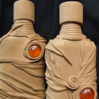 Using unnecessary tights to decorate bottles