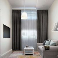 Black tv on a light gray wall