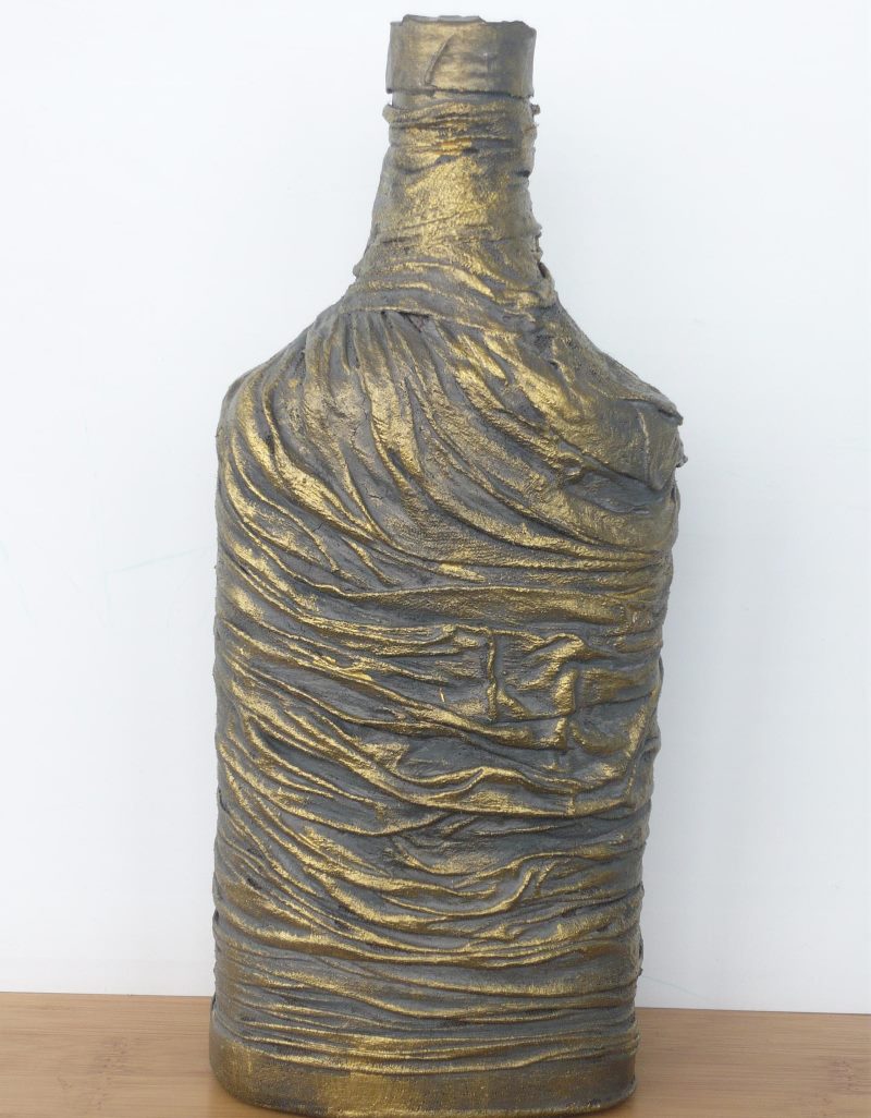 Inked bottle with pantyhose