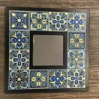 Mosaic patterns on the mirror frame