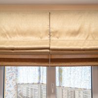 Close-up Roman curtains in brown